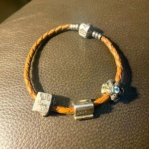 PANDORA girls tan bracelet with three charms!